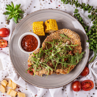 Свинина по-міланськи з картоплею фрі